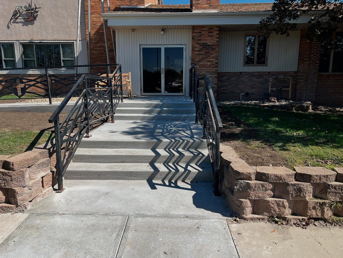 Decorative concrete steps with chevron pattern